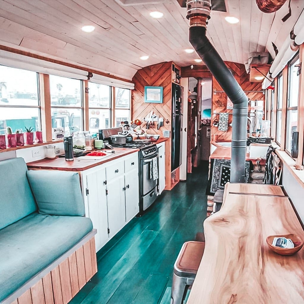 Today we're featuring the Deliberate Life Bus skoolie - a bus conversion with the most gorgeous floors and color scheme we've ever seen. | Since We Woke Up | sincewewokeup.com