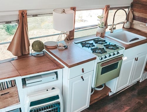 Today we're featuring the Sloth High Five skoolie - a bus conversion with that lives up to the motto, "Adventure is out there!" | Since We Woke Up | sincewewokeup.com